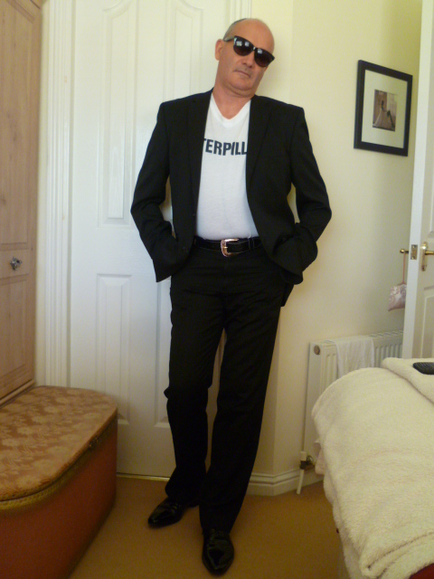 mature male escort fun50geeze in suit and shades
